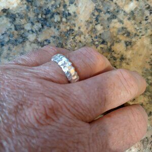 beautiful 9999 pure silver ring by opv with a natural arc welded pattern